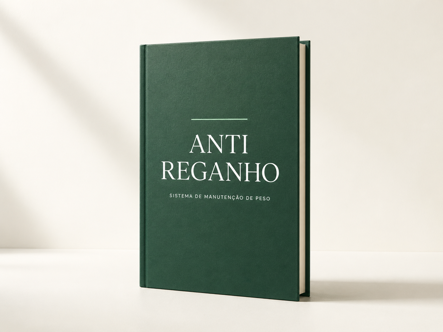 Capa do Manual Anti-Reganho — livro verde escuro com tipografia editorial.